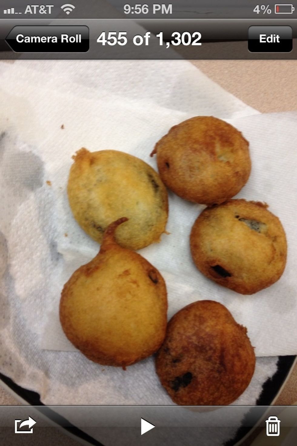 Place Fried Oreos on some paper towels to drain excess oil, they should look like this! (Note: some are darker than others..SMH, don't let them get too dark.) They taste best when served hot!