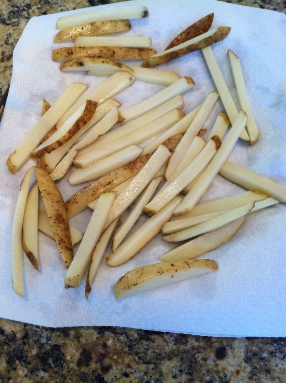 Place fries on paper towels. Let them get to room temperature before frying the 2nd time for best results