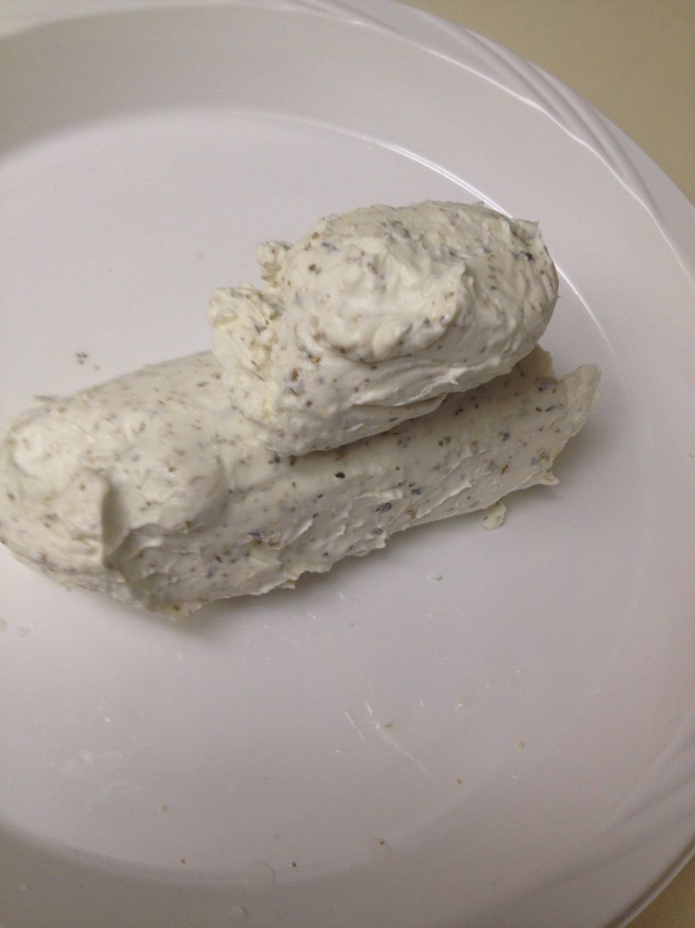 Place goat cheese in a shallow dish.