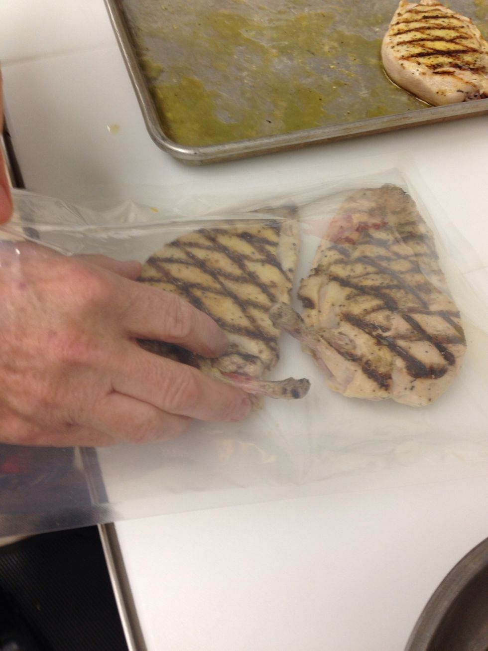 Place grilled chicken into sous vide bag.