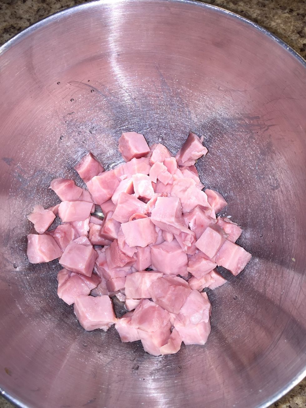 Place ham into a bowl