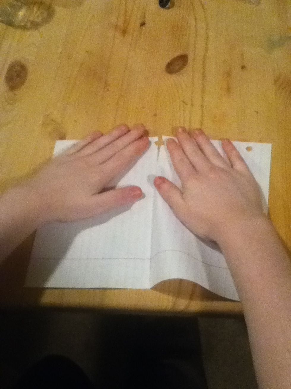 Place hands on either side and firmly pull apart.