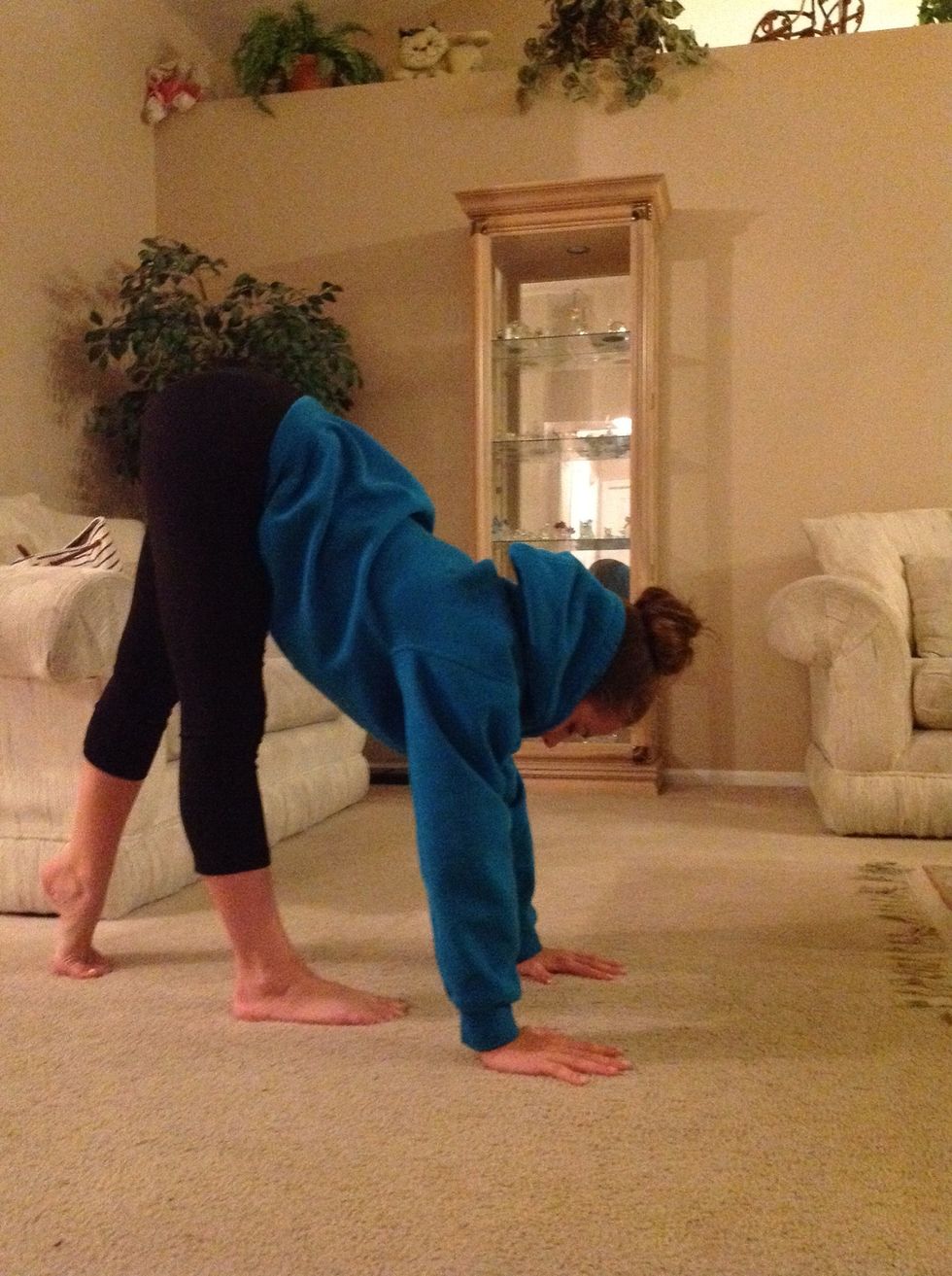 Place hands on the floor and begin to kick your legs in the air.