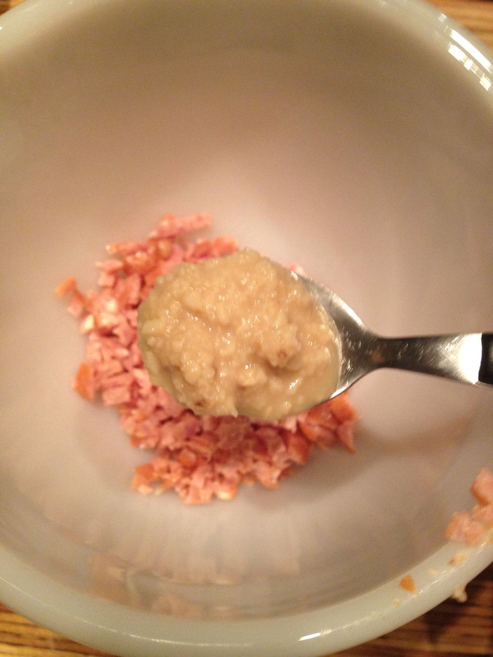 Place in a bowl and add crushed garlic two teaspoon