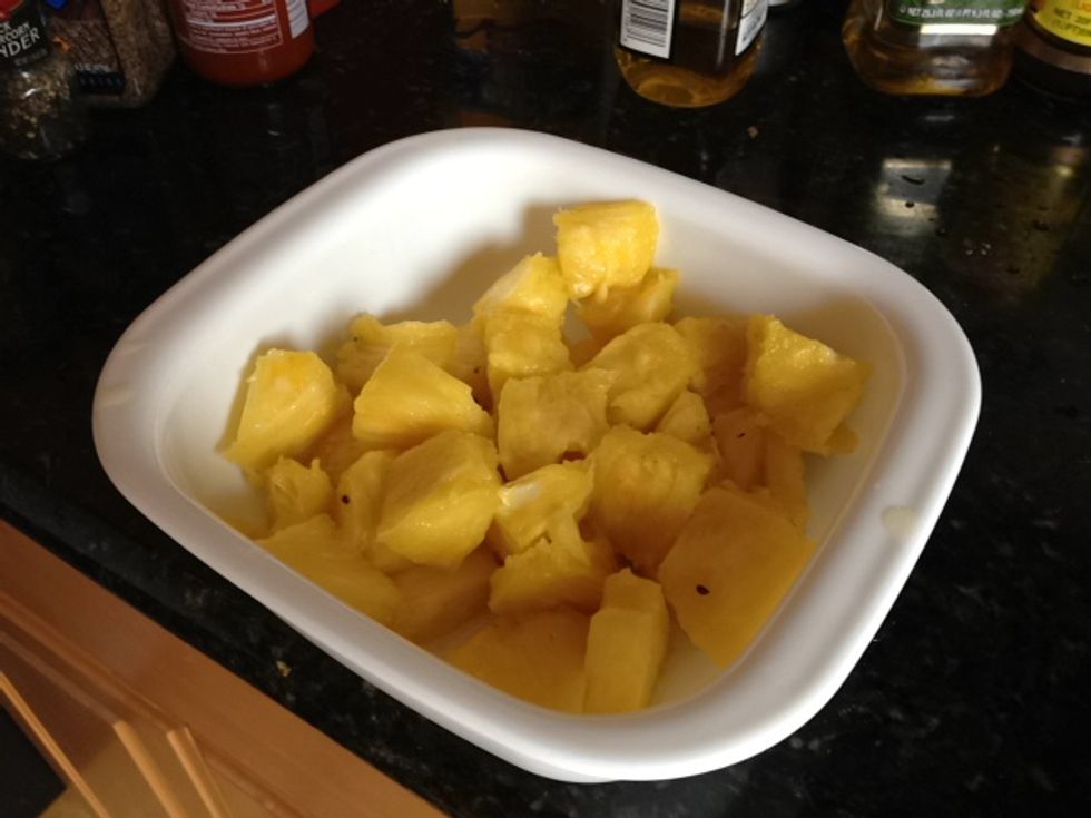 Place in a bowl and let the sliced pineapple chill in the fridge.