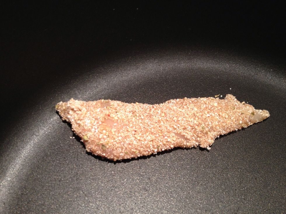 Place in a frying pan on a medium heat. If your pans aren't super non-stick you may need to add some oil before adding the chicken