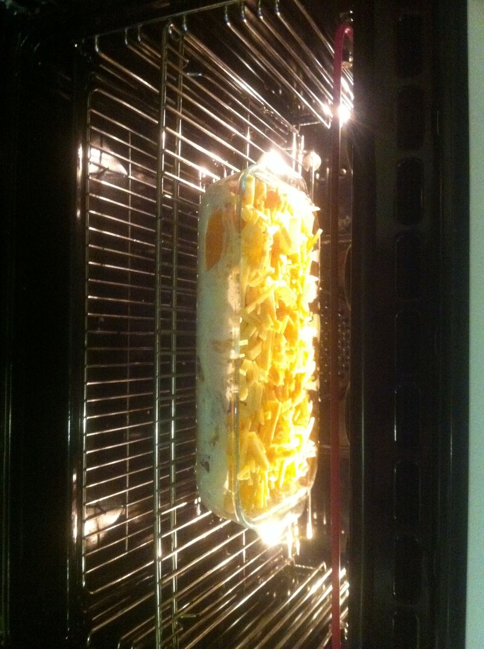 Place in a medium temp oven until potato is cooked and cheese is golden brown on top.