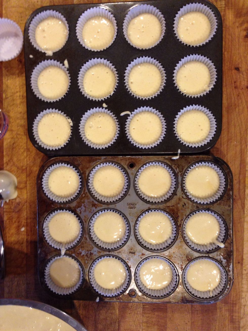 Place in a parchment lined baking pan, or in a cupcake tin lined with paper cups, don't grease the pans!
