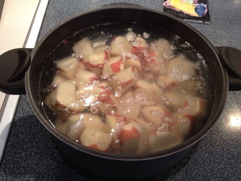 Place in a pot of boiling water and cook over medium heat until potatoes are soft, about 20 minutes.
