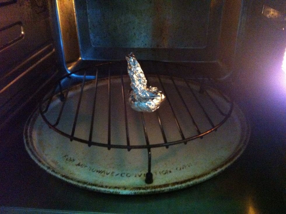 Place in an oven. I know i know...this looks like a microwave, it isn't. It's a convention oven + microwave. NEVER MICROWAVE FOIL OR METAL! PLZ PLZ DON'T!