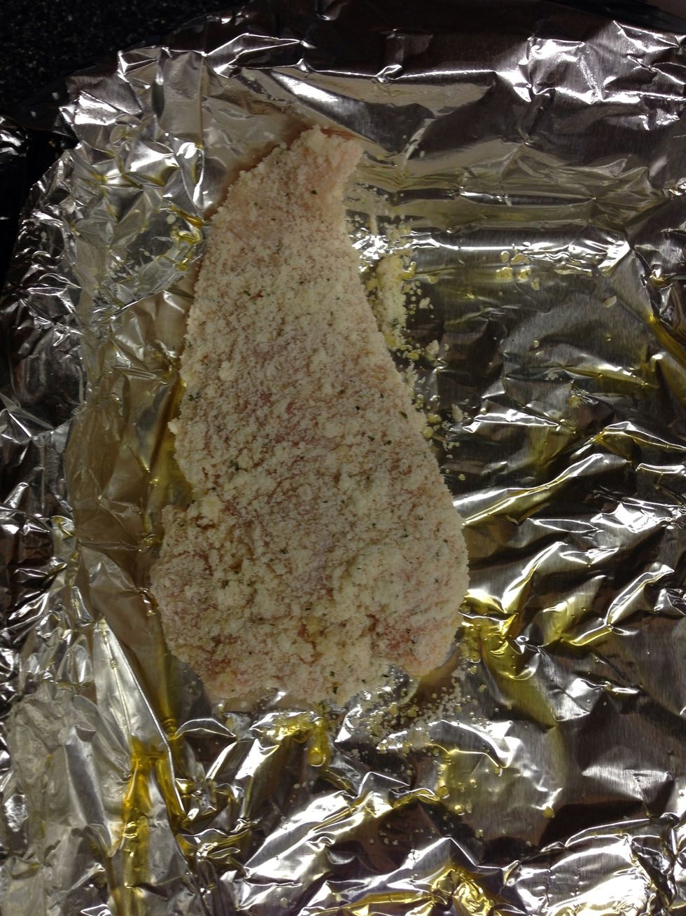 Place in greased baking pan. Do this for each piece. I lined my baking dish with foil, which I sprayed with Pam to keep the chicken from sticking. And for easy clean up! \ud83d\ude0a