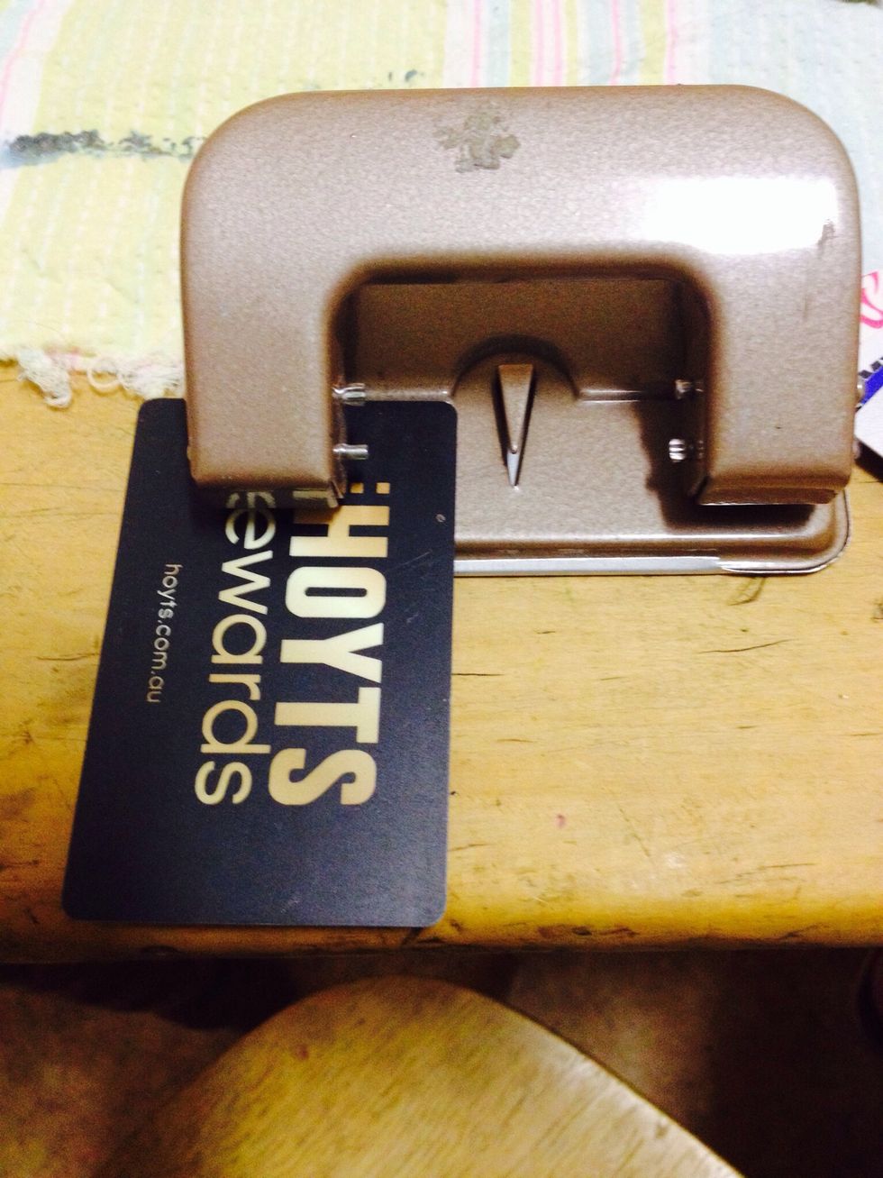Place in hole punch and punch away