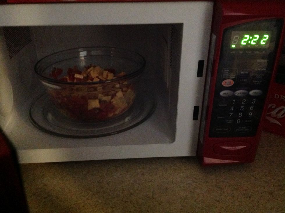 Place in microwave. Start with 2minutes and 22 seconds
