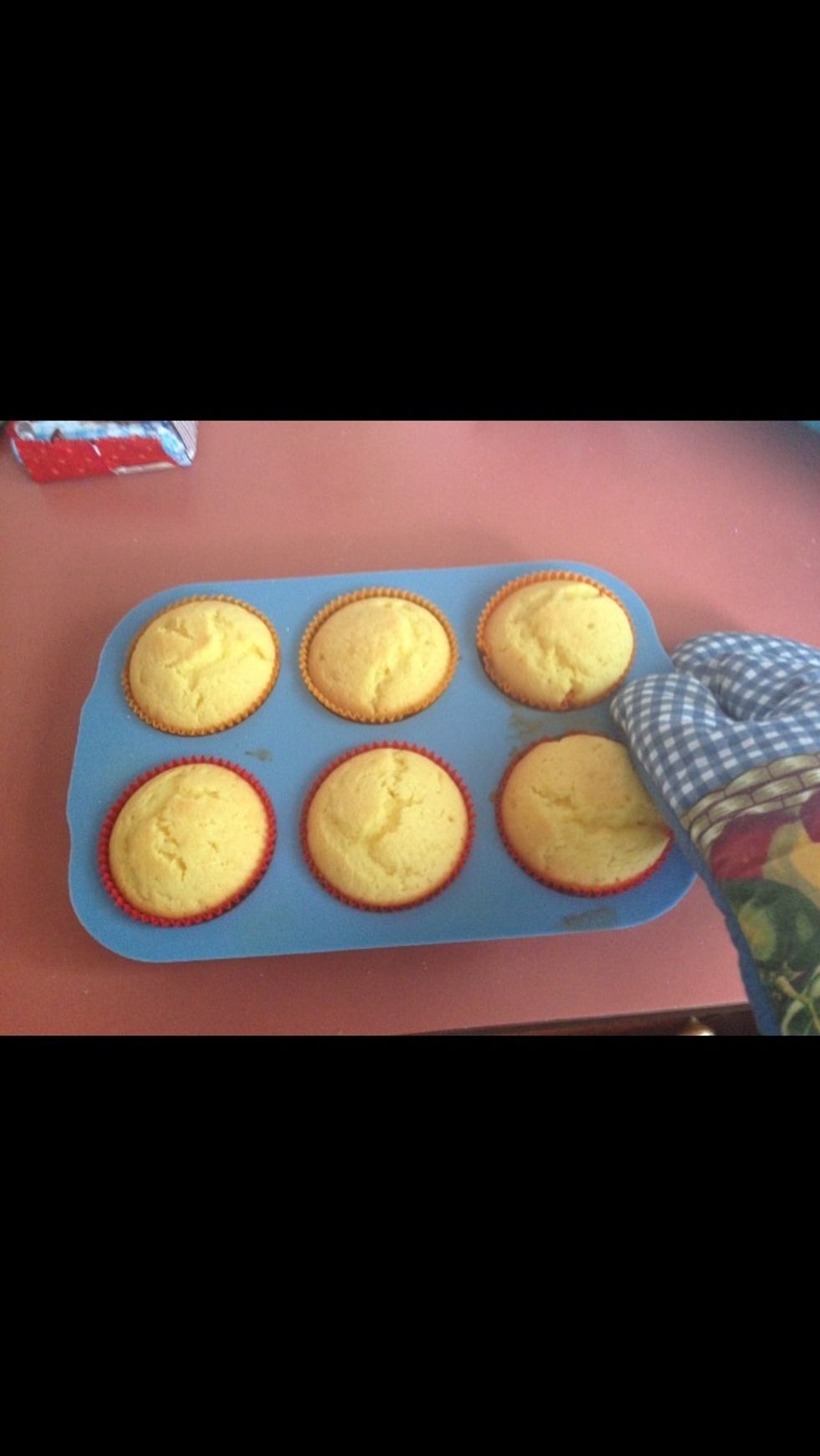 Place in oven. Cook the cupcakes for 20 minutes until Skewer comes out clean and are a golden colour.