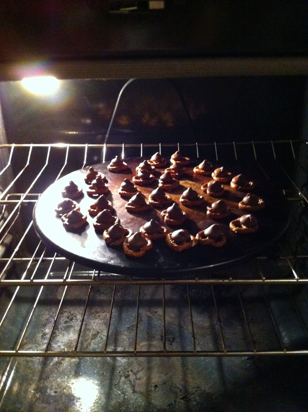 Place In oven for a couple minutes to let the chocolate soften, but not for so long that the chocolate completely melts.
