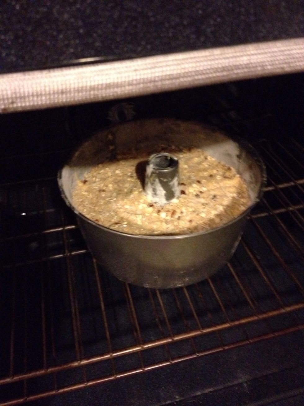Place in the middle of 350\u00b0F preheated oven and back for 50-60 minutes.