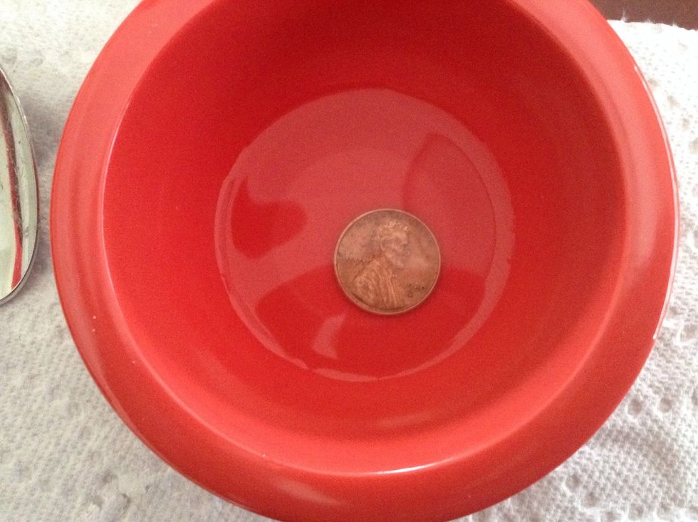 Place in the penny and watch it become new again.
