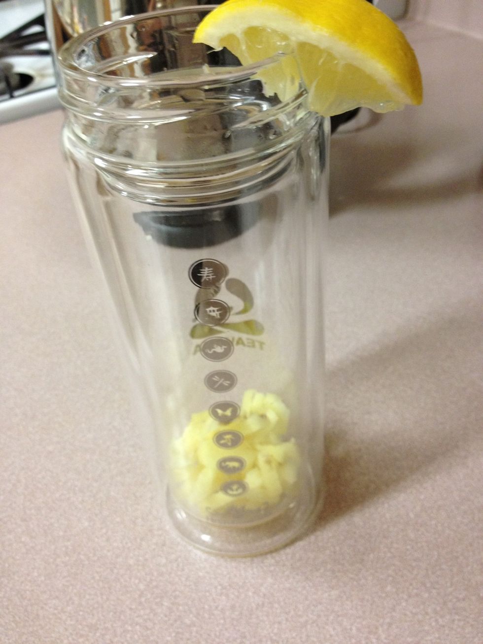 Place in thermos or heat retaining vessel Add : Lemon slice