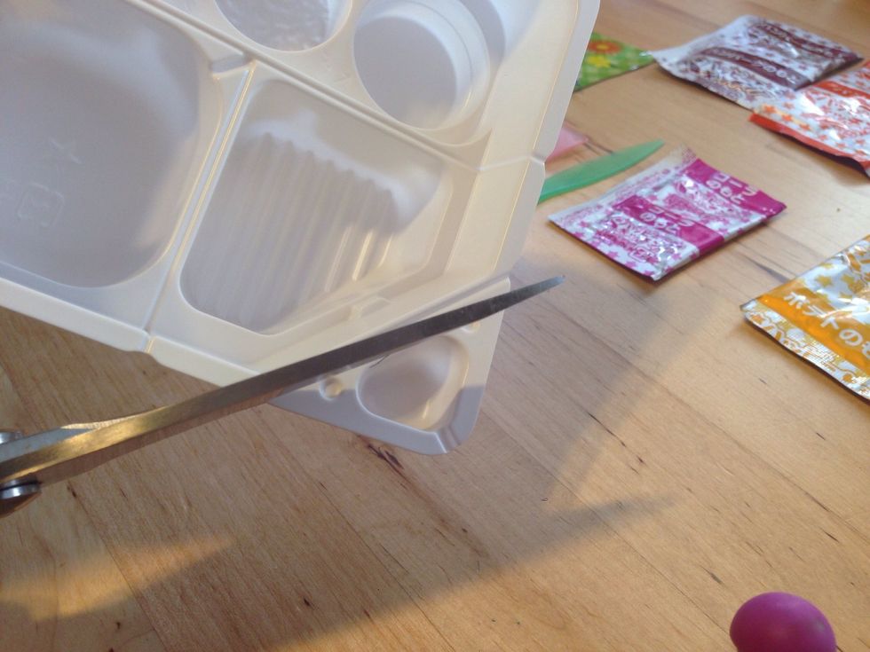 Place ingredient packets off to side and get Tray, which will be cut in 3 pieces--First, Cut the small Triangular section--This will be used as Water Scoop