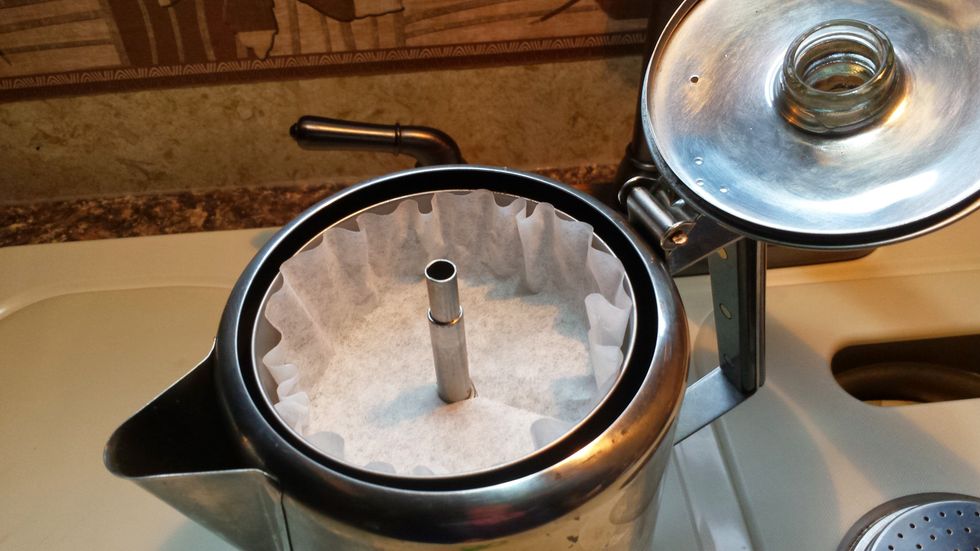 Place inside top basin.