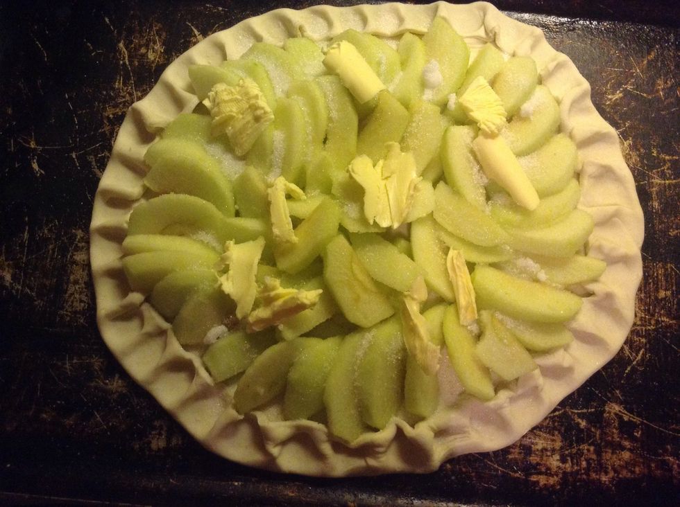 Place into a 200\u00b0C oven for 30 minutes or until the edges have risen and become golden brown.