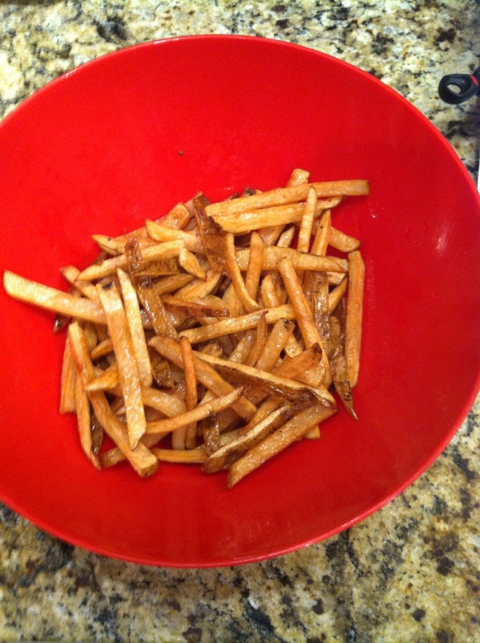 Place into a bowl and add the truffle oil and salt. Just give it a few tosses