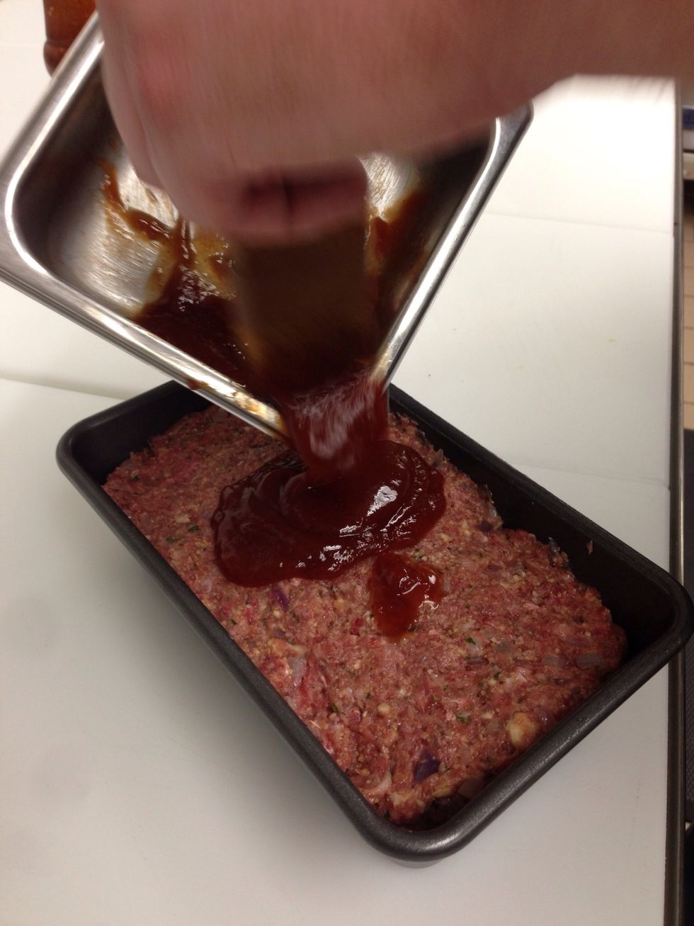 Place into greased pan, brush ketchup mixture on top.