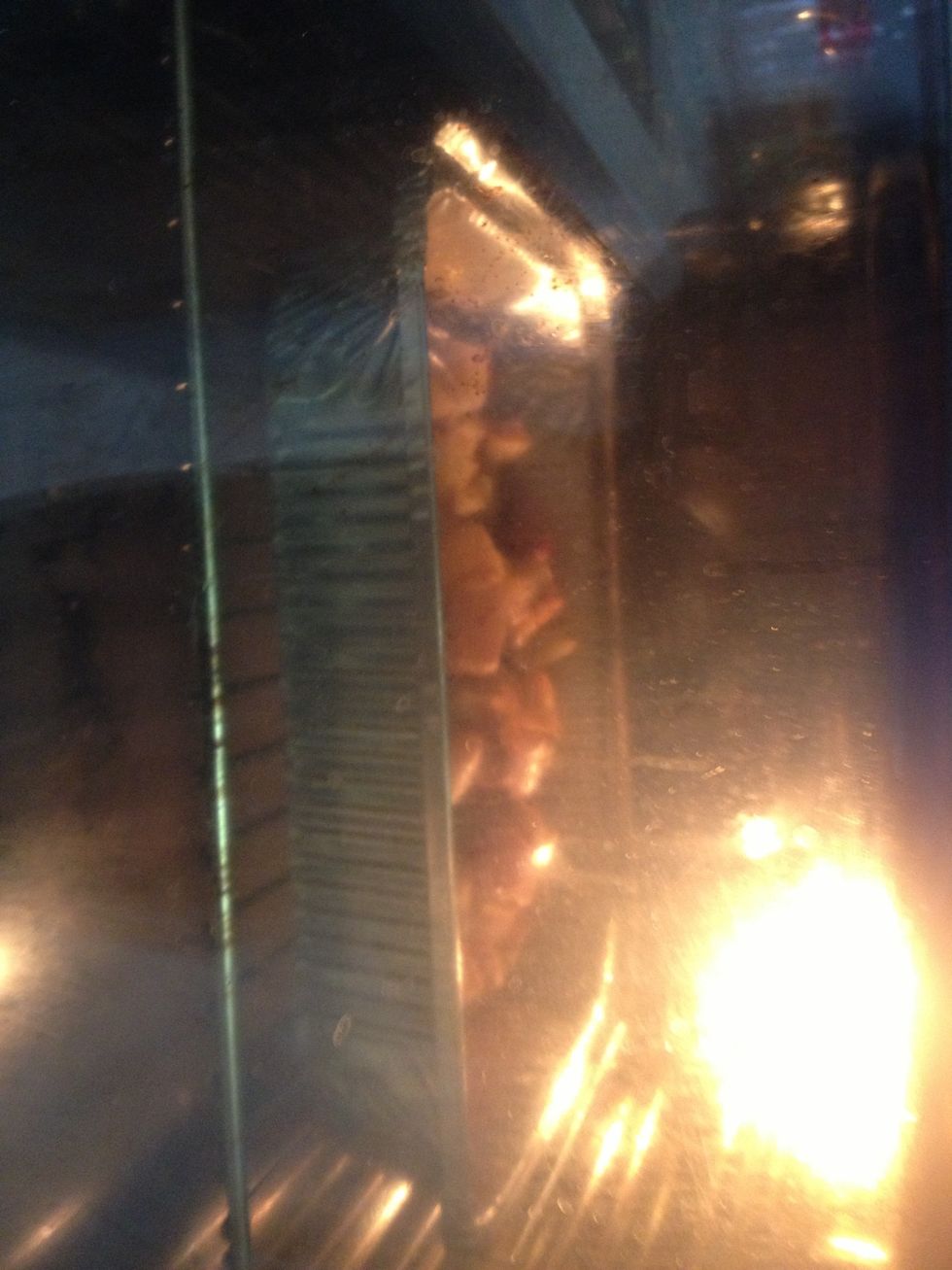 Place into the pre-heated oven. After 25-30 minutes we will take out the tray, mix the potatoes (so those on the bottom will get crispy too) and give it another 5-10 minutes