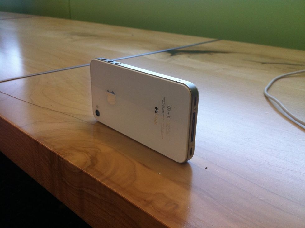 Place iPhone on a desk with camera pointing to yourself...