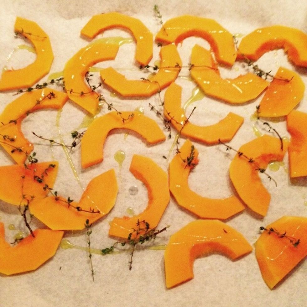 Place it in a baking tray with greaseproof paper. Cover with some thyme and drizzle with olive oil. Cook for 10-15min at 200C