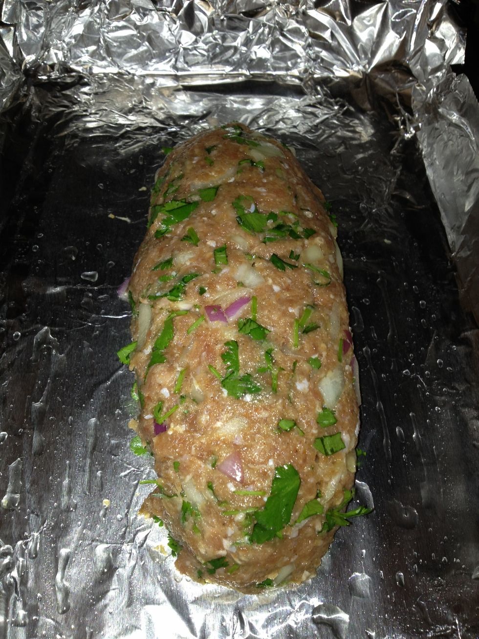 Place it in a greased baking dish and bake it in a preheated Owen at 350 degrees for an hour to 1 hour 15 mins till it turns brown