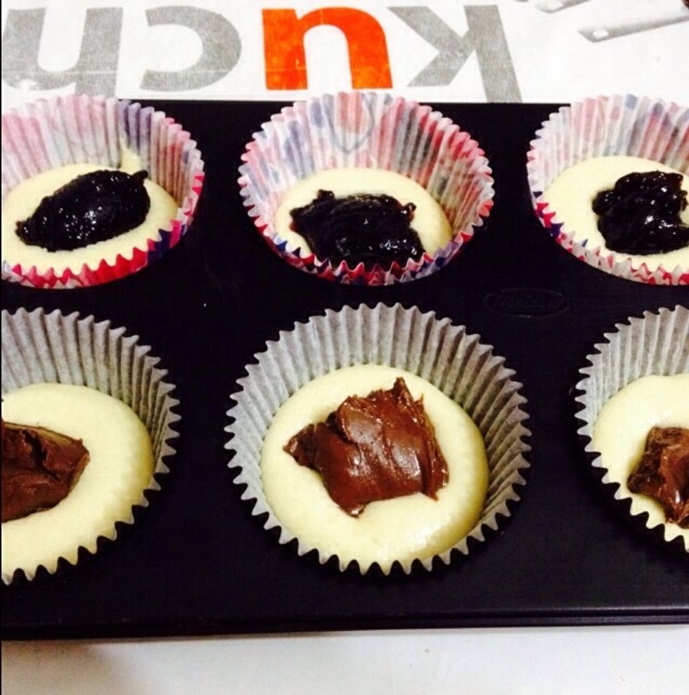 Place it in the middle of the baking cup, be cautious not to let it stick at the edges.