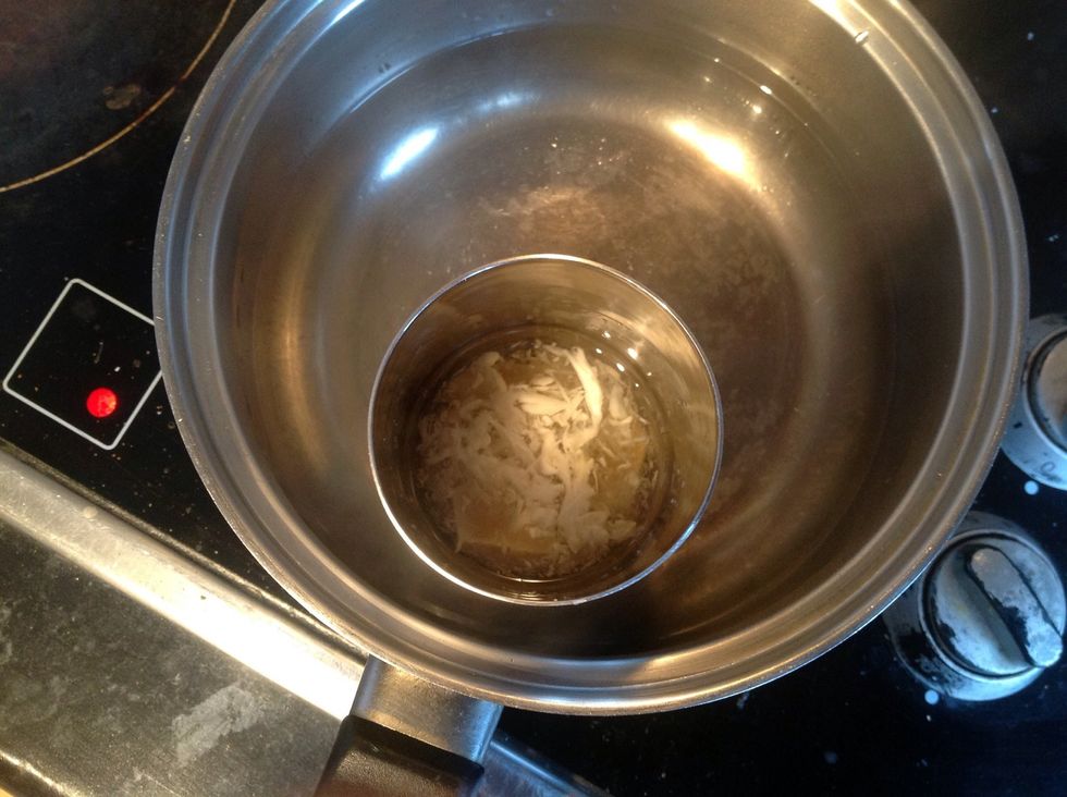 Place it inside a pot which has a inch of boiling water to melt.