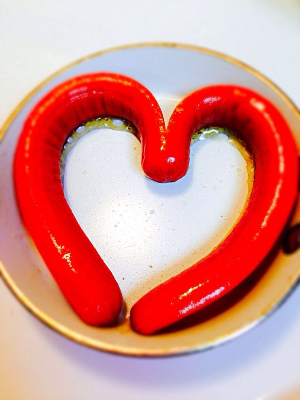 Place it on a frying pan with some oil shaped into a heart
