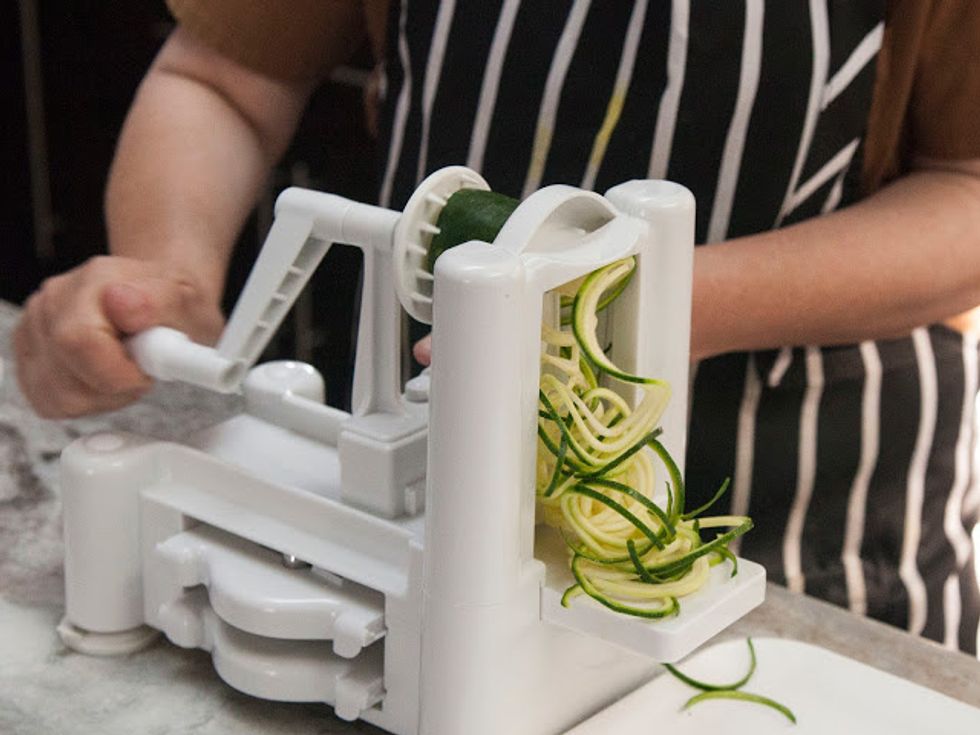 Place it on the spiralizer using the noodle blade and turn.