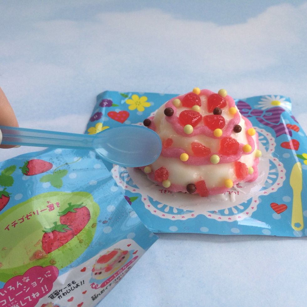 Place leftover jelly bits around cake