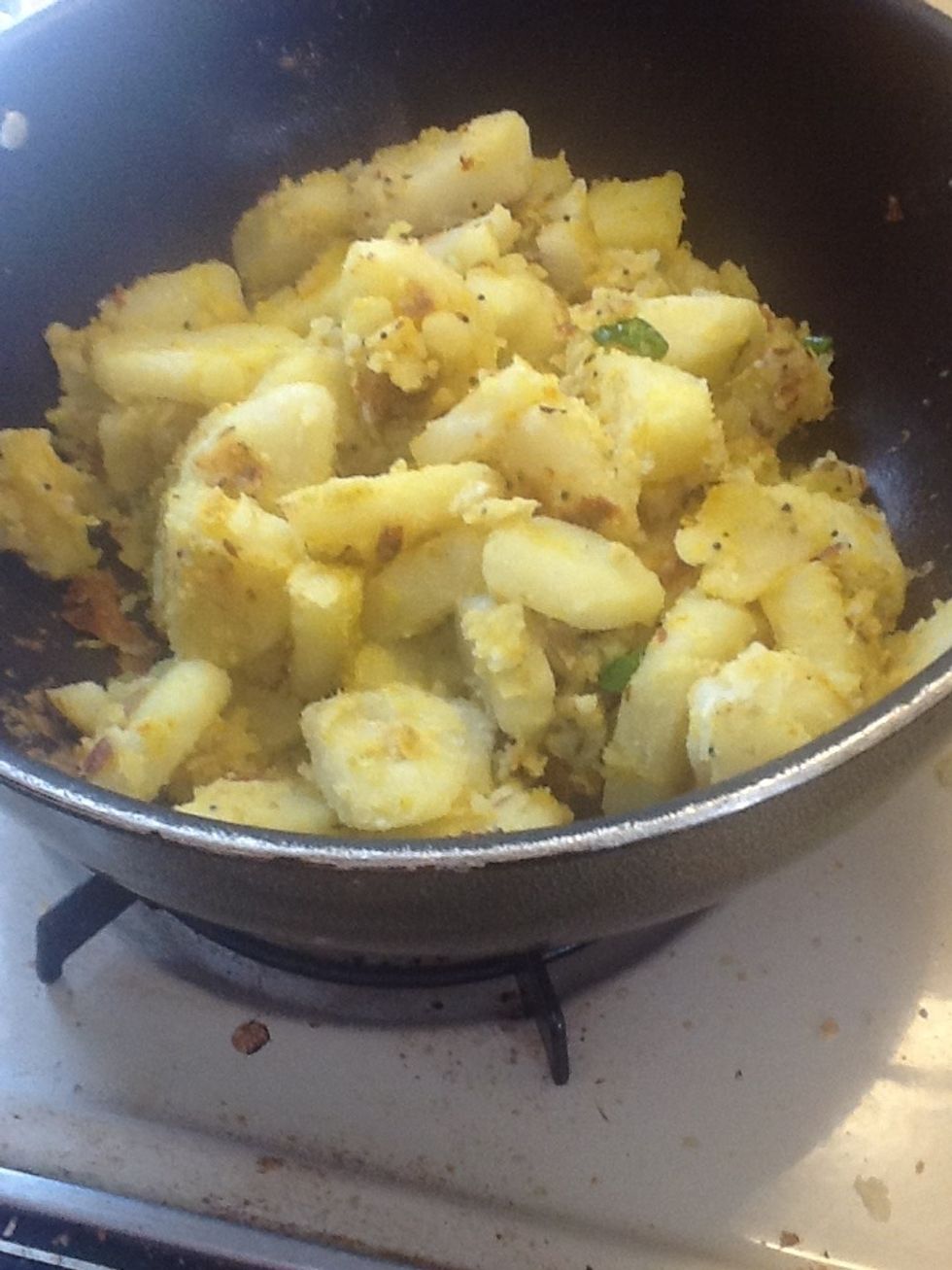 Place lid and cook over low flame for about 10minutes. Mix in between so that the potatoes don't stick to the vessel or burn :)