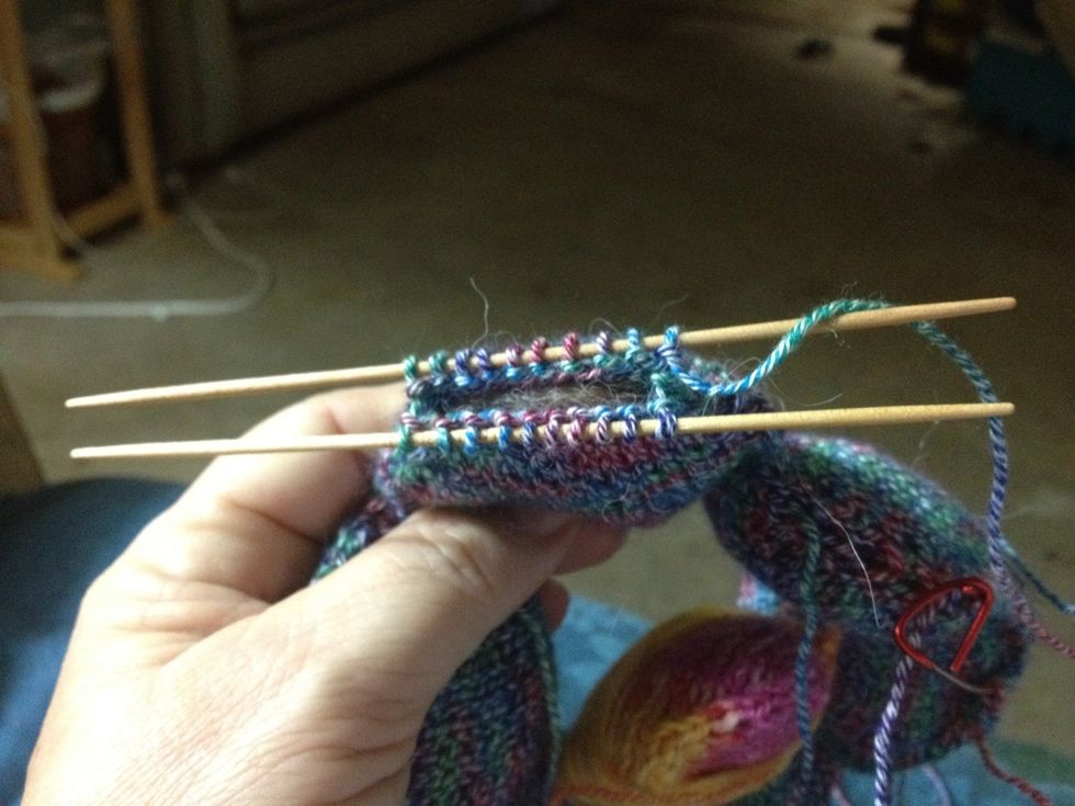 Place live stitches on needles smaller than those used to knit the puff -- just to make seeing & doing the grafting easier. Be sure the stitch with the working thread is on the back needle (from you).