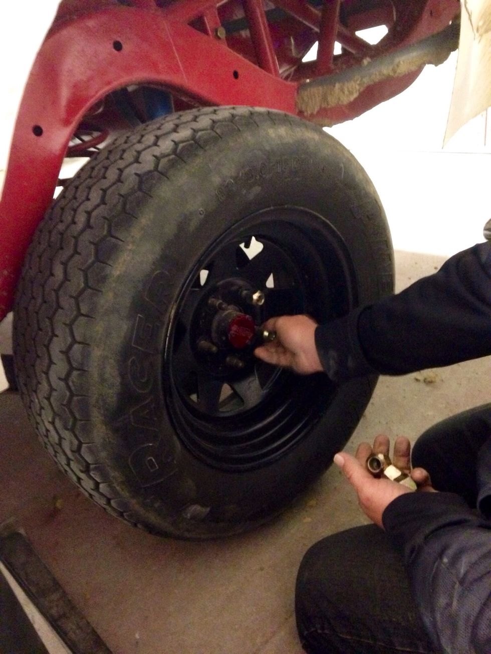 Place lug nuts back on.
