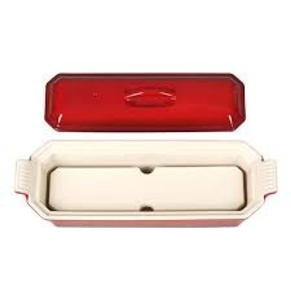 Place meat mixture into terrine. Push down to remove any air pockets.