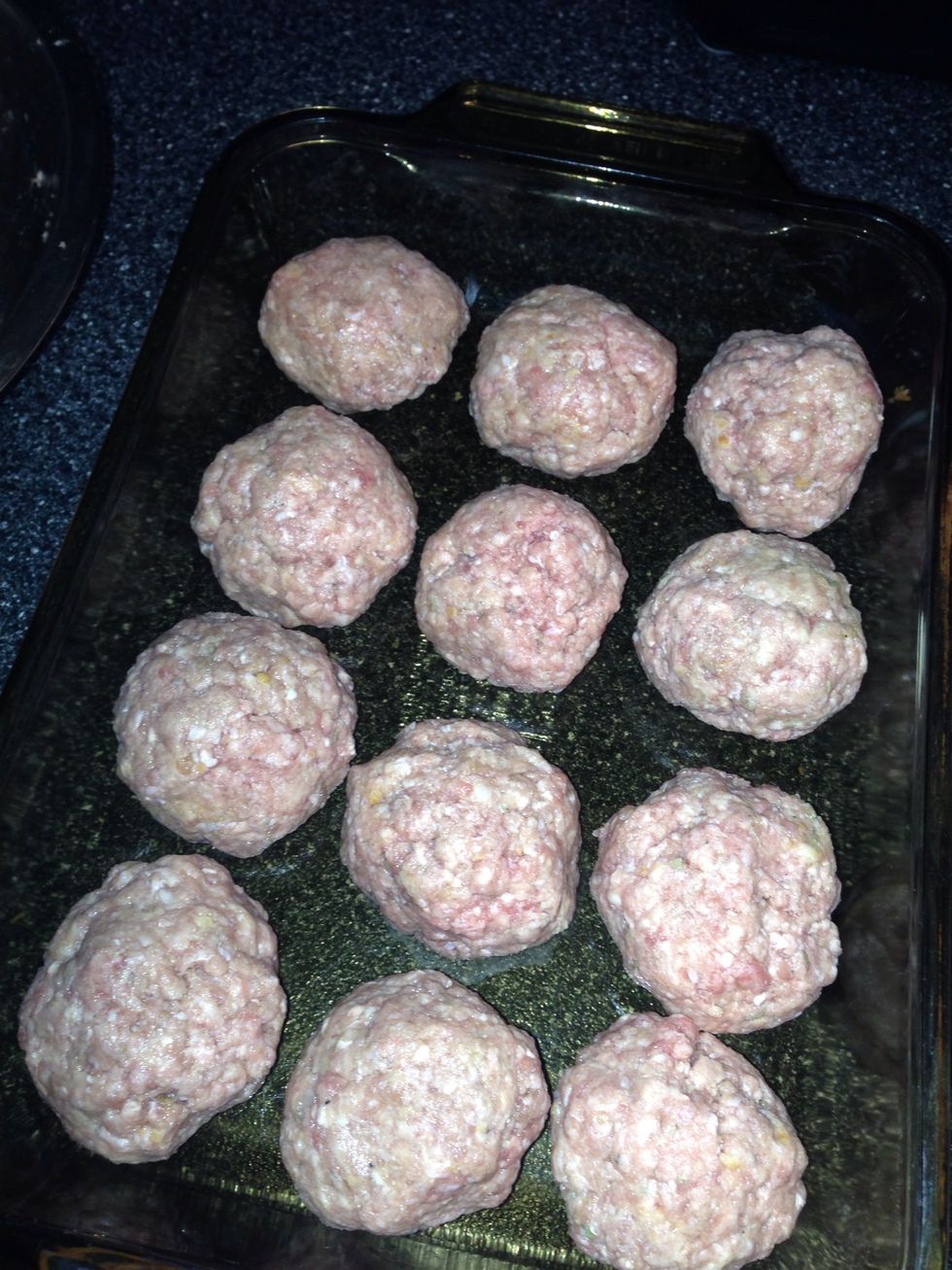 Place meatballs into baking dish. I was lazy & made larger size meatballs. Make size according to your liking.