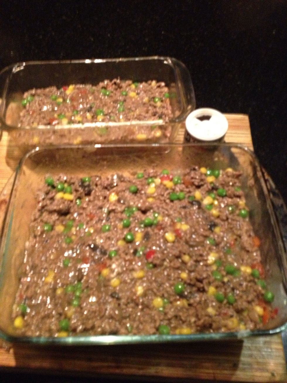 Place mince in oven dishes