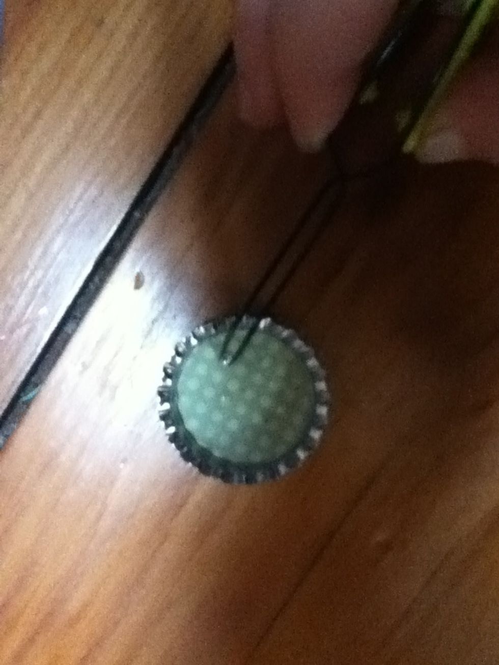 Place mini rhinestones on each of your glue dots. Tweezers help, but are not mandatory.