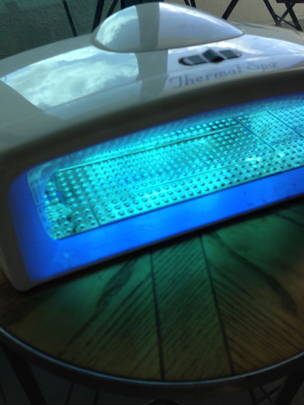 Place nails under UV light for 2 minutes. (**The time may vary depending on the light. Mine is just a regular, fairly cheap lamp with 2 18w UVA light bulbs.. Stronger lamps = shorter curing times).