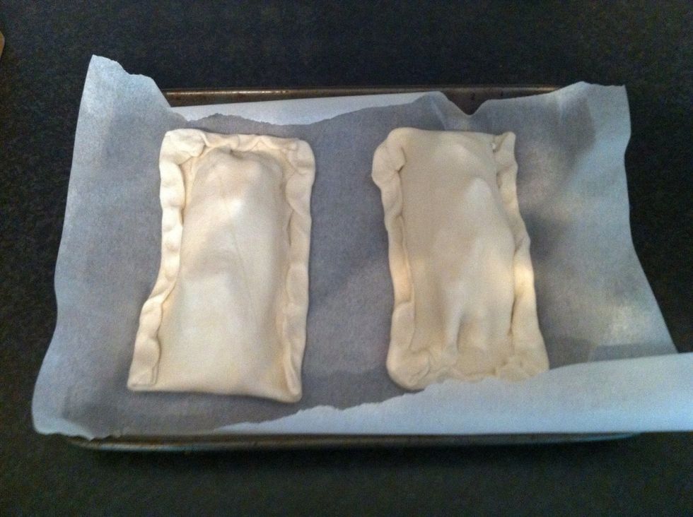 Place on a baking tray lined with baking paper. Place in the oven for 25 mins until they turn golden brown in colour