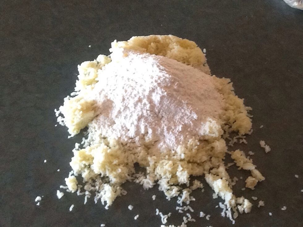 Place on a bench and add flour, egg an salt while you mix