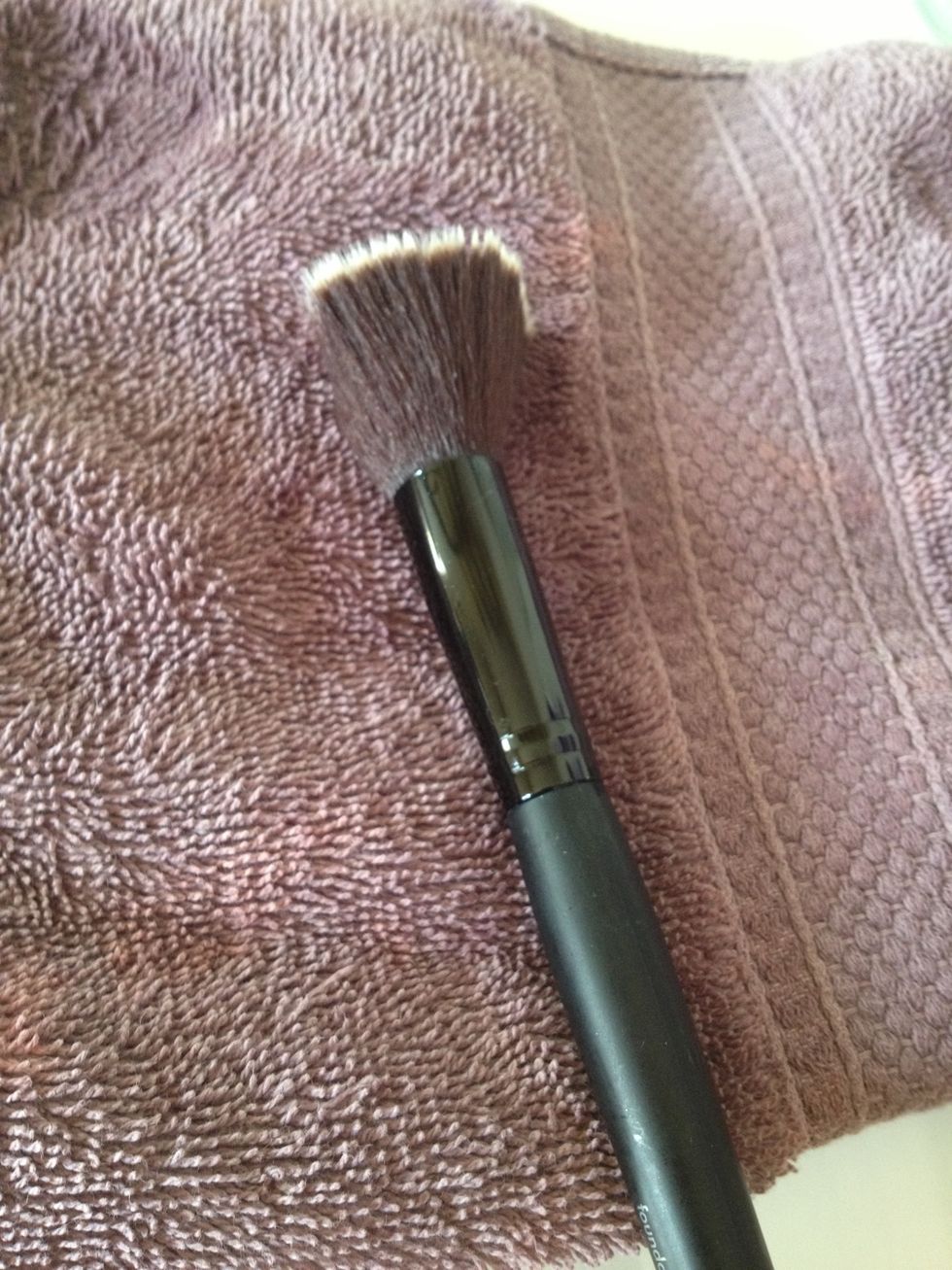 Place on a hand towel and let the brush dry for as long as needed.