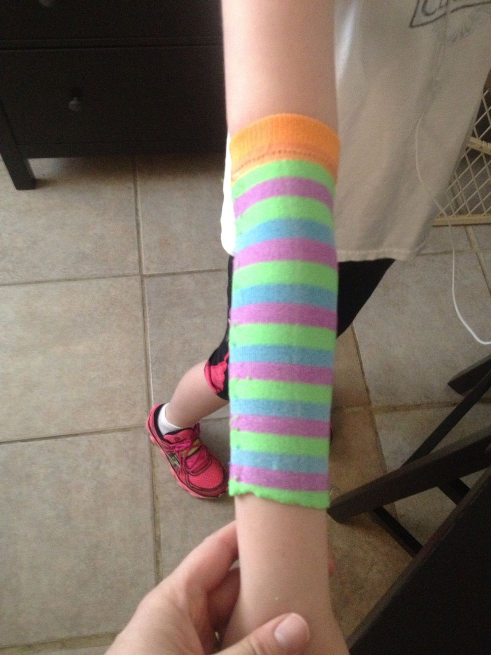 Place on arm like so with sock cuff at top