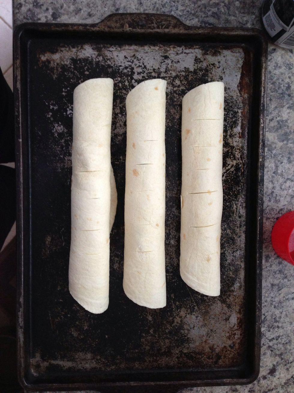 Place on non-stick tray. If its not non-stick you can spray Pam onto a paper towel and wipe down the surface of the tray.