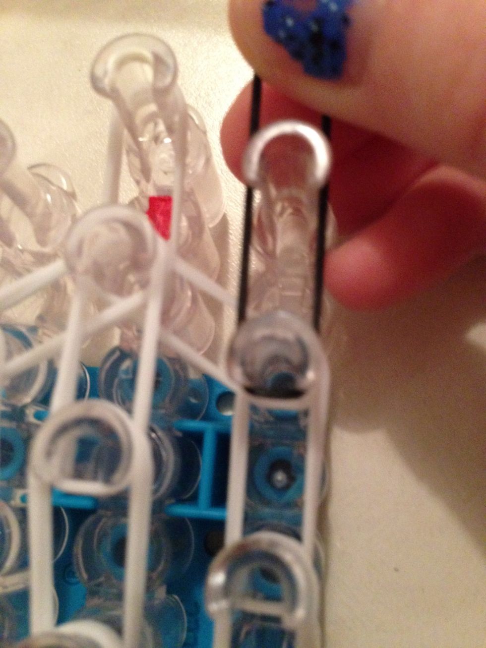 Place on the head of your panda (at the top of your loom)